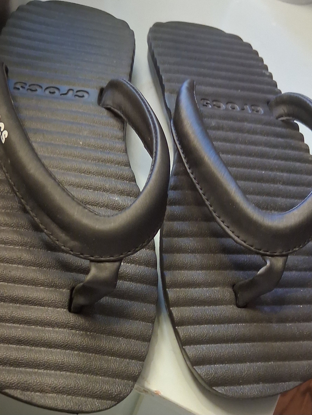 Crocs Women’s Black Foam Flip Flops